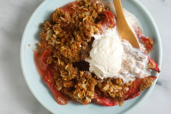 A bowl of food with a spoon

AI-generated content may be incorrect.
